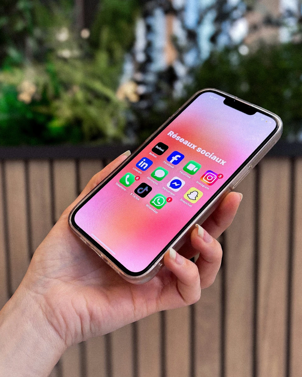 Smartphone displaying social media apps